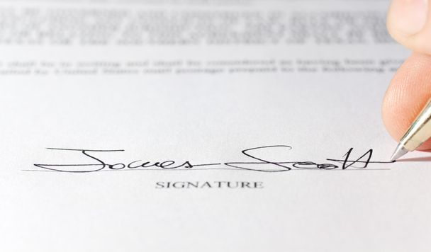 Imaginary signature on a contract - 写真・画像