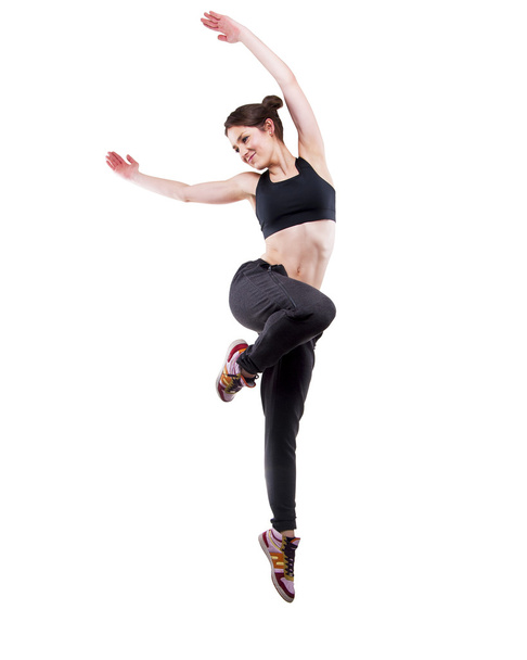 танцівниця сучасного стилю позує на студійному фоні
 - Фото, зображення