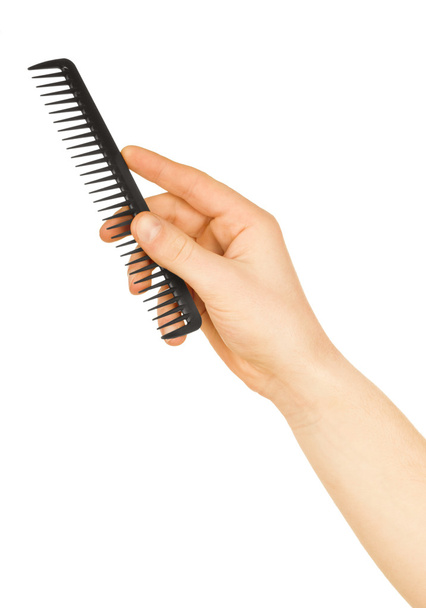 Hairbrush in the hand isolated on white - Foto, Bild