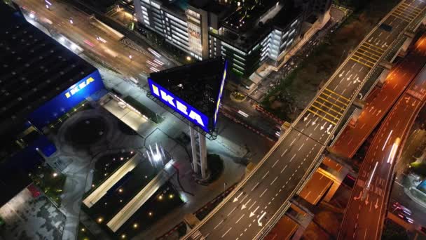 Bukit Bintang, Kuala Lumpur, Malesia - marraskuu 20 2023: Auton valoteiden harmoninen liike, joka luo kaupunkienergian lumoavan sinfonian - Materiaali, video