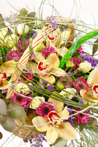 Beautiful flowers in a basket - Fotó, kép
