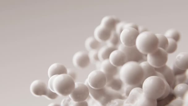 Abstracto 3D renderizar animación movimiento lento leche blanca lechosa orbes mate fondo animado metaballs manchas partículas burbujas morfología moléculas voladoras papel pintado presentación médica telón de fondo - Imágenes, Vídeo
