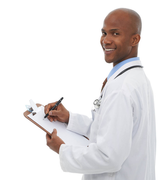 Clipboard, black man and portrait of happy doctor writing medical prescription, medicine report or healthcare information. Hospital services, clinic paperwork and studio surgeon on white background. - Photo, Image