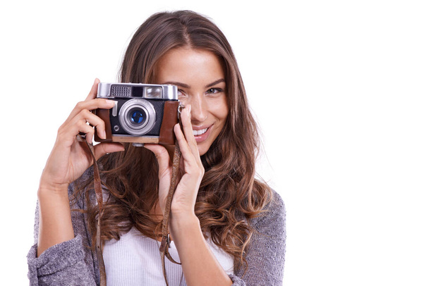 Portrait, photographer and happy woman with retro camera in studio for photoshoot, content creation and paparazzi on white background. Journalist, photography and creative production at mockup space. - Photo, Image