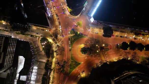 Bukit Bintang, Kuala Lumpur, Malezja - 02 gru 2023: Obrót z powietrza patrząc w dół na Brickfield sin night - Materiał filmowy, wideo