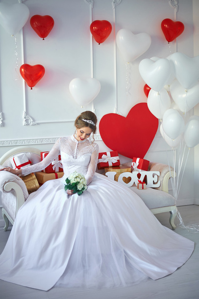 Pretty bride in a white interior - Zdjęcie, obraz