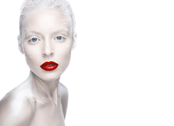Beautiful girl in the image of albino with red lips and white eyes. Art beauty face. - Valokuva, kuva