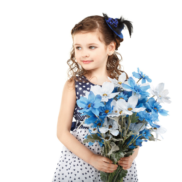Portrait of a beautiful little girl with flowers - Fotografie, Obrázek