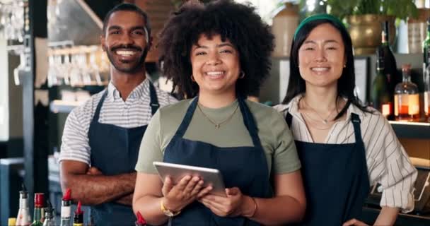 Diversity, restaurant and portrait of team at bar with manager, waiter and waitress at startup with digital app. Bistro, service barman and welcome, happy small business owner at cafe with tablet - Footage, Video