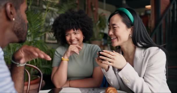 People, friends and talking with coffee at cafe for social, free time or catch up break together. Happy group smile enjoying conversation with beverage, croissant or cup of tea at indoor restaurant. - Footage, Video