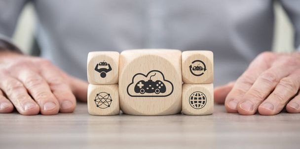 Ξύλινα μπλοκ με σύμβολο της έννοιας του παιχνιδιού σύννεφο - Φωτογραφία, εικόνα