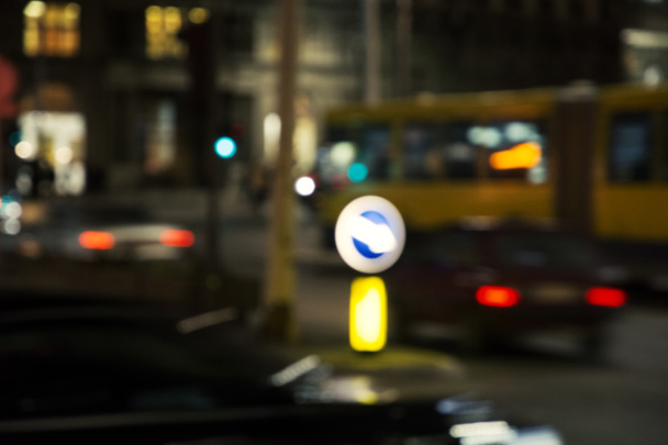 blurred city and people urban night scene - Photo, Image
