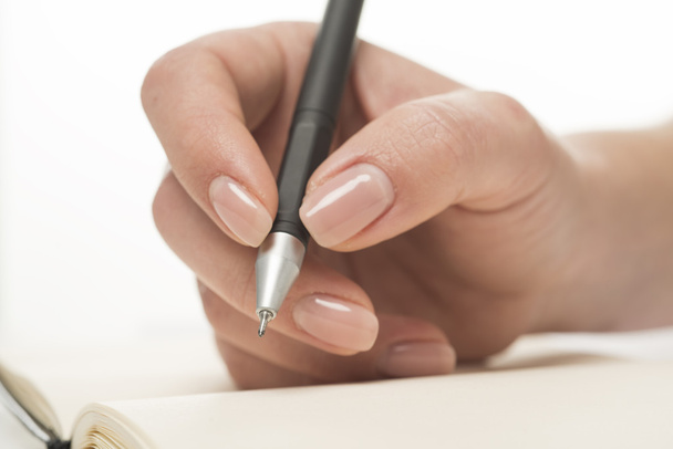 Escritura a mano femenina en cuaderno - Foto, imagen