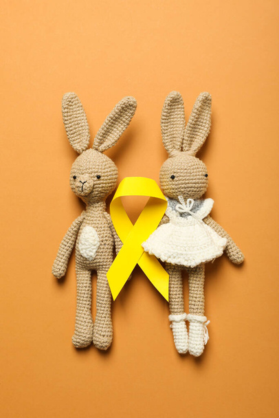 Soft toy bunnies with a yellow ribbon - Photo, Image