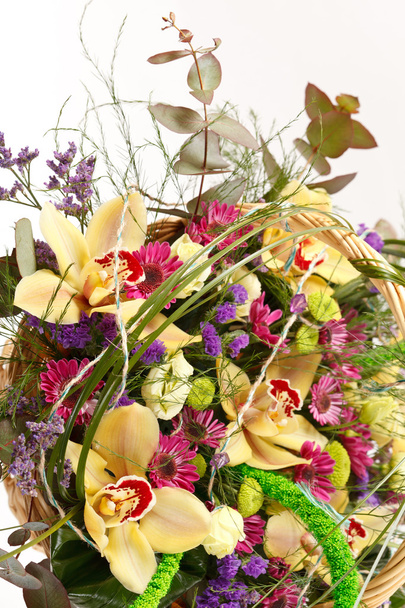 Beautiful flowers in a basket - Φωτογραφία, εικόνα