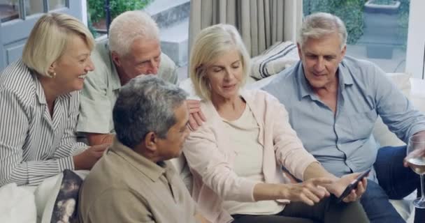 Senior, group and phone with communication on sofa for social media, bonding and internet streaming. Elderly, friends and smartphone or technology with conversation, memories and relationship in home. - Footage, Video