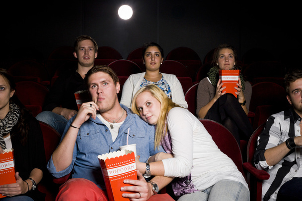 Young couple at cinema - Photo, Image