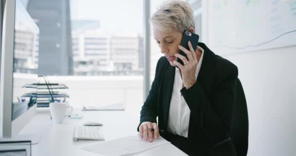 Phone call, ceo and woman take notes, conversation and communication in office. Smartphone, senior business person and document of happy accountant listening to information, negotiation and writing. - Footage, Video
