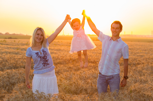 Family with daughter having fun - Fotografie, Obrázek
