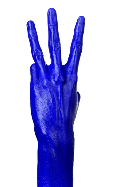 Blue hand on white background, isolated, paint - Foto, afbeelding