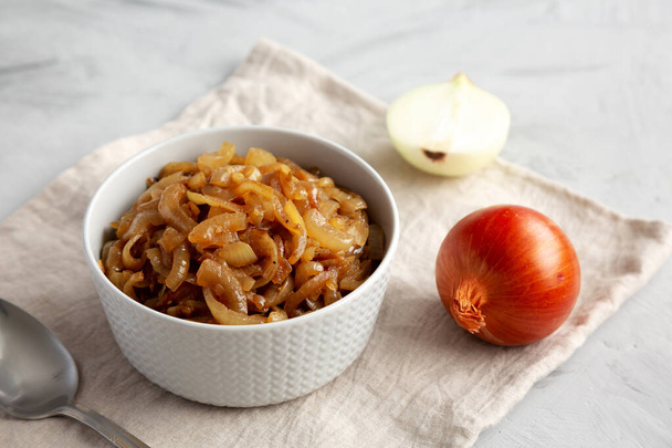 Organic Caramelized Onions in a Bowl, side view.  - Photo, Image