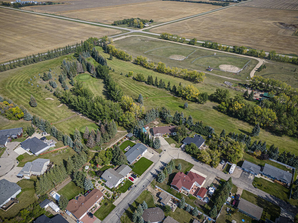 Drone image capturing the town of Waldheim in Saskatchewan, showcasing its rural charm and serene surroundings - Photo, Image
