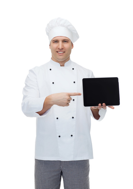 happy male chef cook showing with tablet pc - Fotó, kép