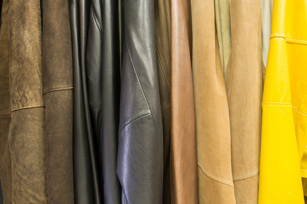 hanging a lot of leather jackets - Photo, Image
