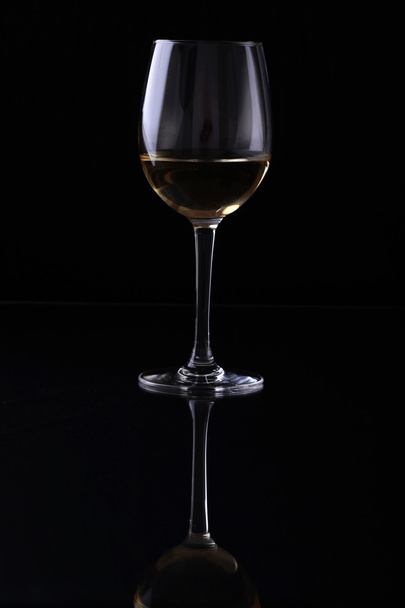 Glass with white wine - 写真・画像