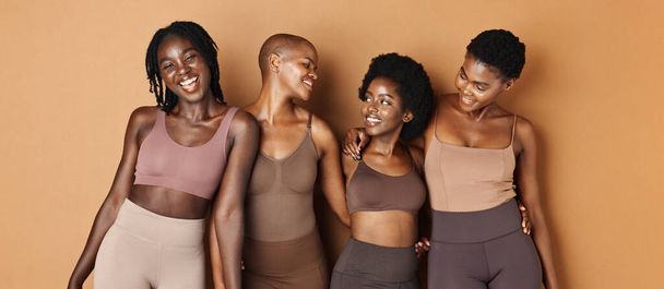 Hug, face or African models with beauty, glowing skin or results isolated on brown background. Facial dermatology, friends or natural cosmetics skincare in studio with black women or happy people. - Photo, Image