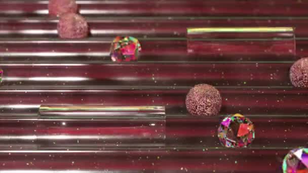 Zauberhafte 3D-Animation glitzernder Kristalle und Kugeln, die durch einen Flipper im Weltraum reisen. - Filmmaterial, Video