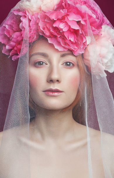 tender portrait of woman in spring flowers.  - Foto, imagen