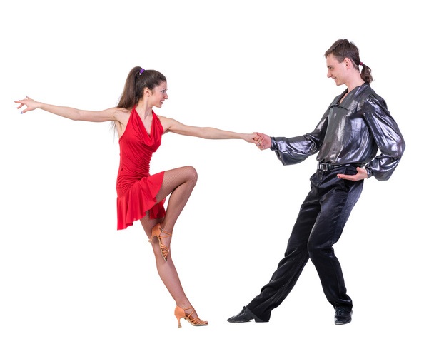 Full length of young ballet couple dancing on white background - Photo, Image