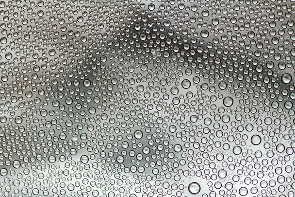 Vidrio con gotitas de agua
 - Foto, imagen