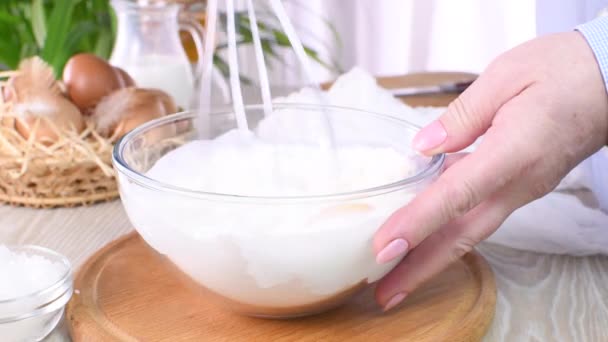 Whisk the mixture to prepare thin pancakes. One of part of a series of video recipes. Real time, close-up. - Footage, Video
