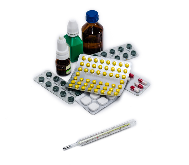Termómetro y embalaje de medicamentos
 - Foto, Imagen