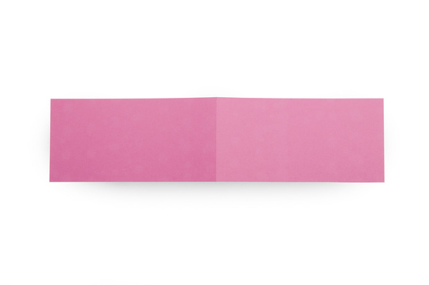 Two fold pink flyers or leaflets on white. - Fotó, kép