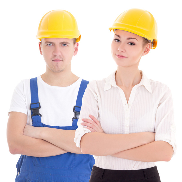 молодой человек builder и бизнес женщина-архитектор в шлеме изолировать - Фото, изображение