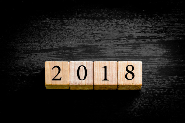 Year 2018 isolated on black background with copy space - Photo, Image