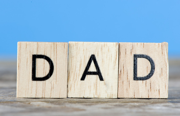 Scrabble letter spelling Dad - Foto, Imagen