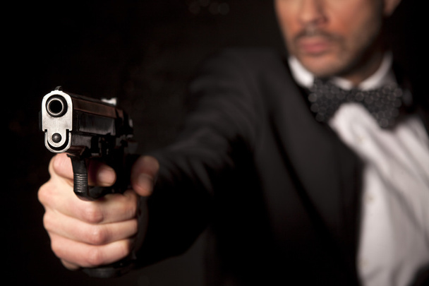 Человек с пистолетом
 - Фото, изображение