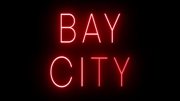 Signo de neón de estilo retro rojo parpadeante que brilla sobre un fondo negro para BAY CITY - Metraje, vídeo
