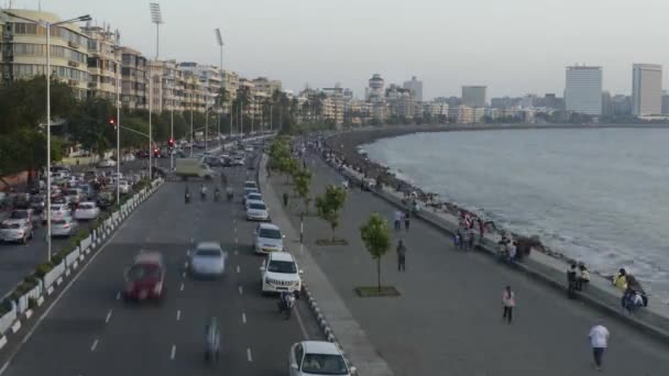 Time lapse of Vehicle Traffic in evening at Marine Drive the Queen's necklace,with new electricity saving LED daylight like street lights, Mumbai, Maharashtra, India. - Footage, Video