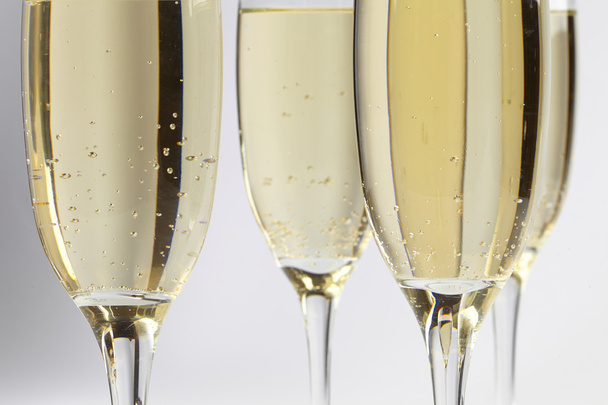 Champagne glasses on white - 写真・画像