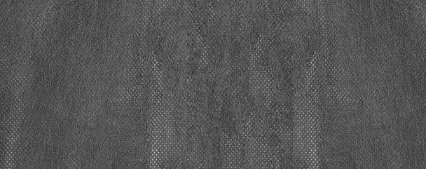 あなたの仕事の概念の設計のための黒い質の背景の生地繊維が含まれている広い黒いマイクロファイバーの布. - 写真・画像