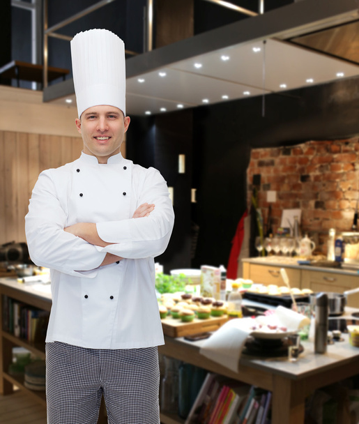 happy male chef cook with crossed hands - Zdjęcie, obraz