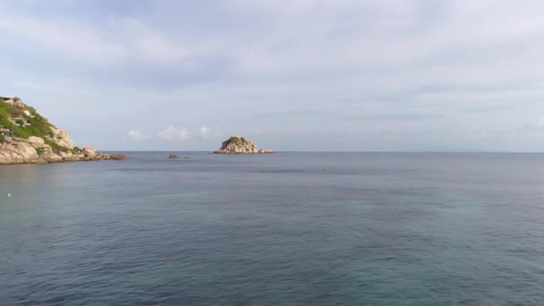 Experience the beauty of Thai beaches and crystal-clear waters in Chumphon. Fly over the serene sea, capturing Freedom Beach and Shark Bay on Koh Tao. Feel the ultimate sense of freedom and - Footage, Video