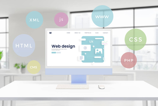 La pantalla de computadora muestra una página conceptual de estudio de diseño web con elementos de diseño. Característica de globos flotantes HTML, PHP, CSS, XML, JS, tecnologías CMS - Foto, Imagen