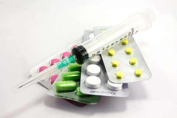 Medication and syringe - Photo, Image