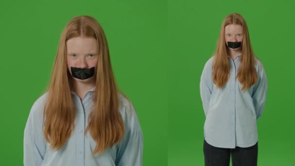 Rozdzielony zielony ekran 2 w 1. Dziewczyna stoi z taśmą na ustach, symbolizującą protest i tłumienie wolności słowa i wyboru. Potężna reprezentacja cenzury i walka o prawa - Materiał filmowy, wideo